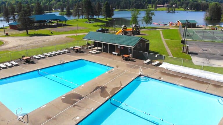 An aerial view of a swimming pool near Rainbow Lake in western New York.