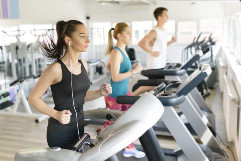 People,running,on,treadmill,at,gym