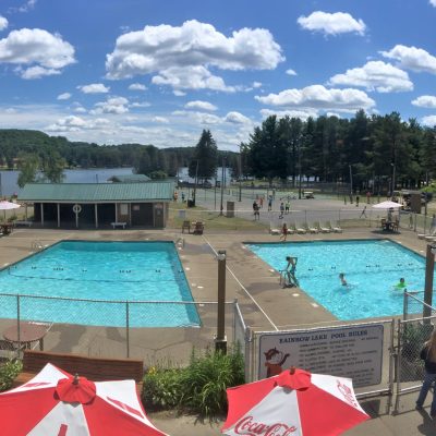 An aerial view of a swimming pool at Rainbow Lake.